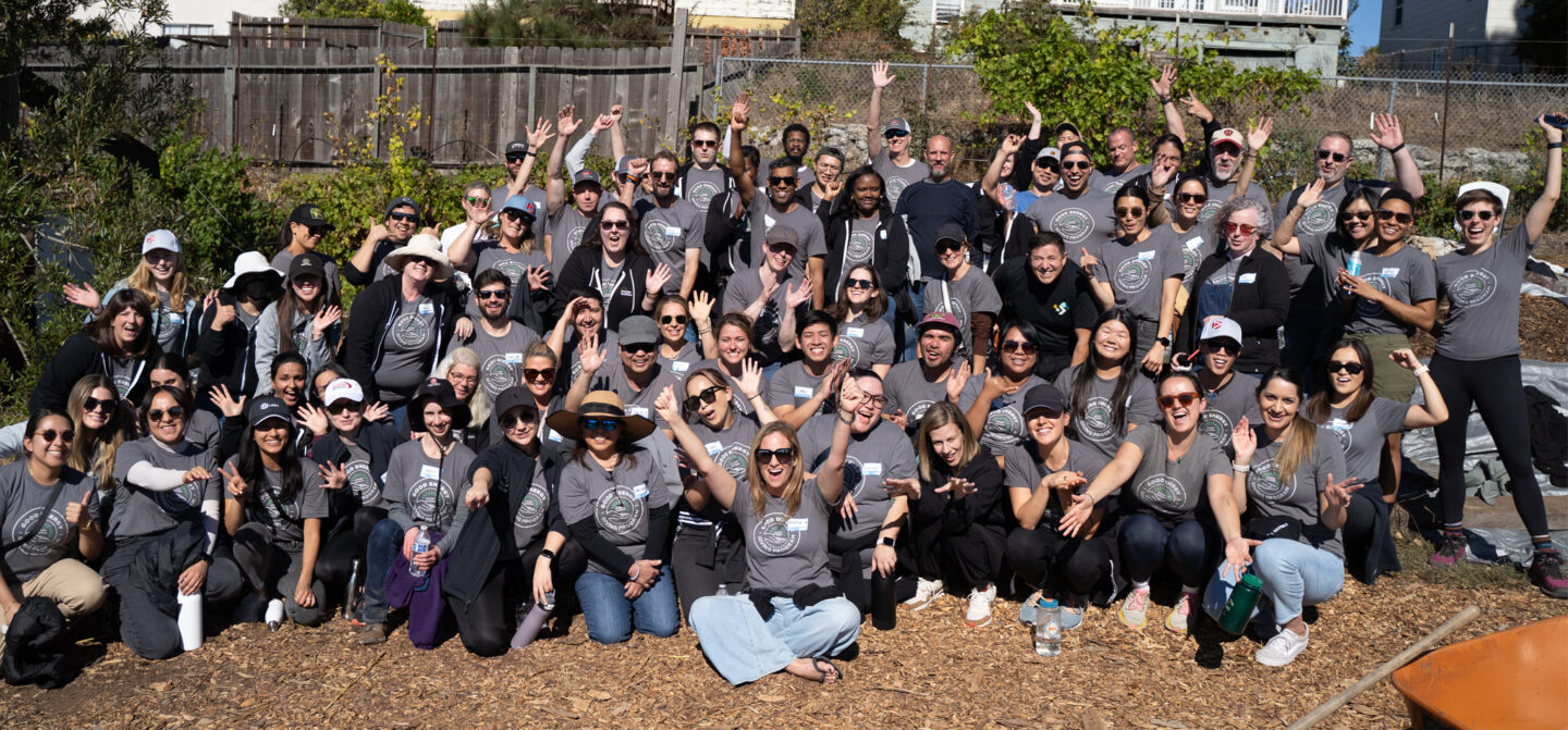 A large group of Premier Nutrition employees during a company-wide giving back day.