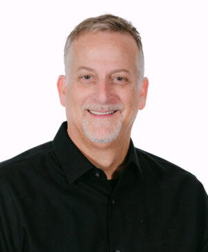 A headshot of Marc Mollere